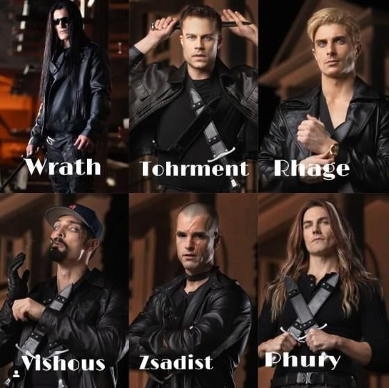 A picture of 6 men styled in the dorkiest fake gangster way you can imagine, words can't capture it. Their names are Wrsrh, Tohrment. Rhage, Vishous, Zsadist, and Phury