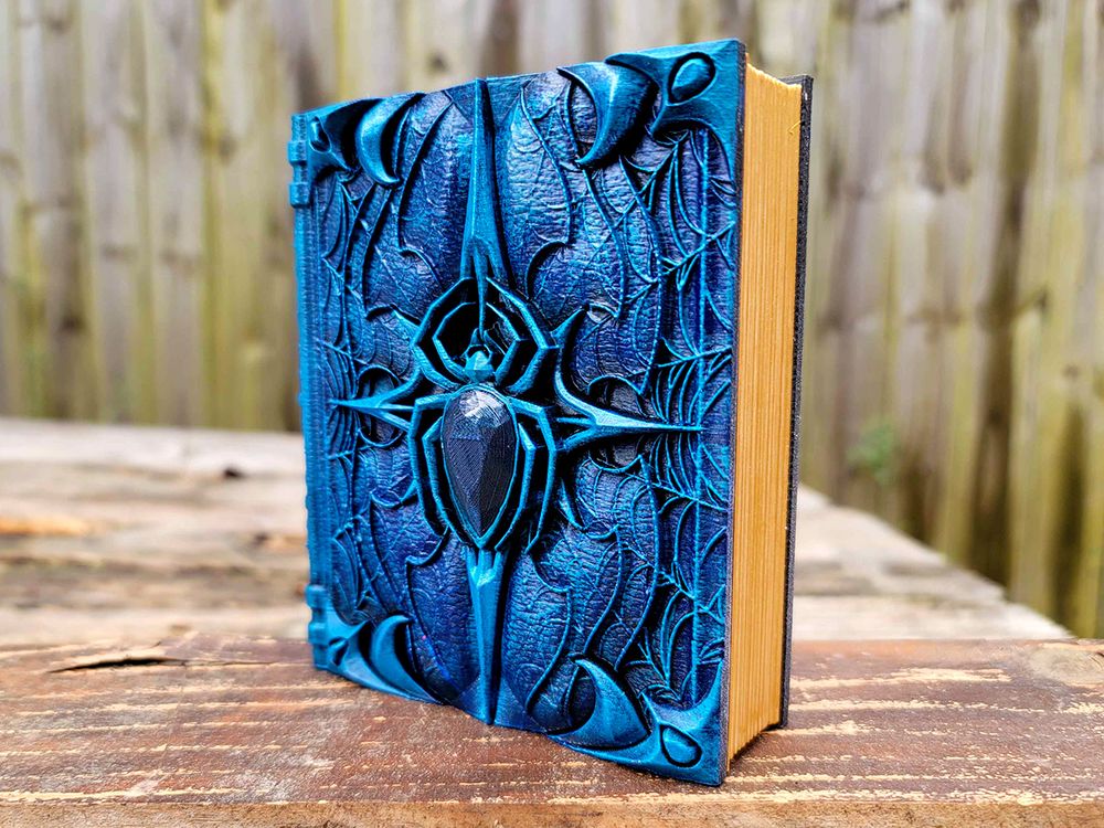 An ancient tome book box with a spider theme! I hate spiders but for some reason I like this one.