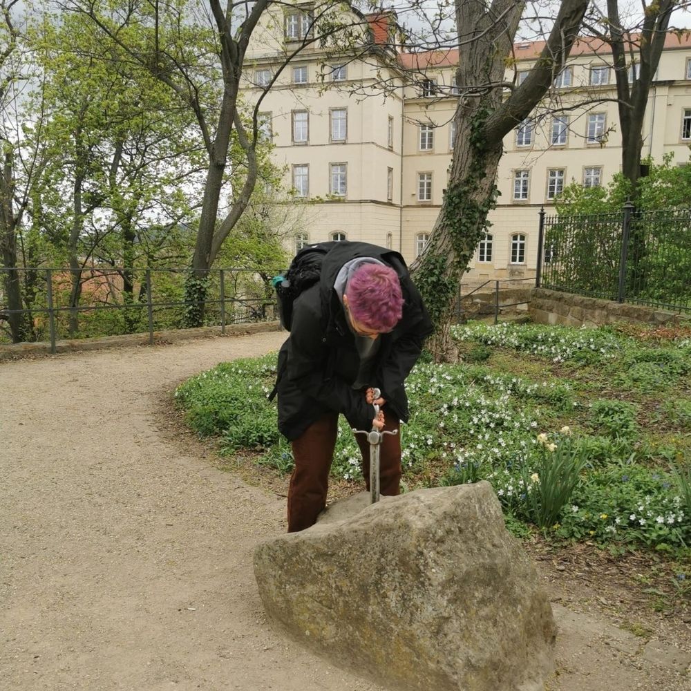 A photo of me about to draw a sword from a stone.