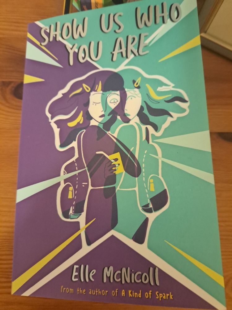 Cover of Show Us Who You Are by Elle McNicoll