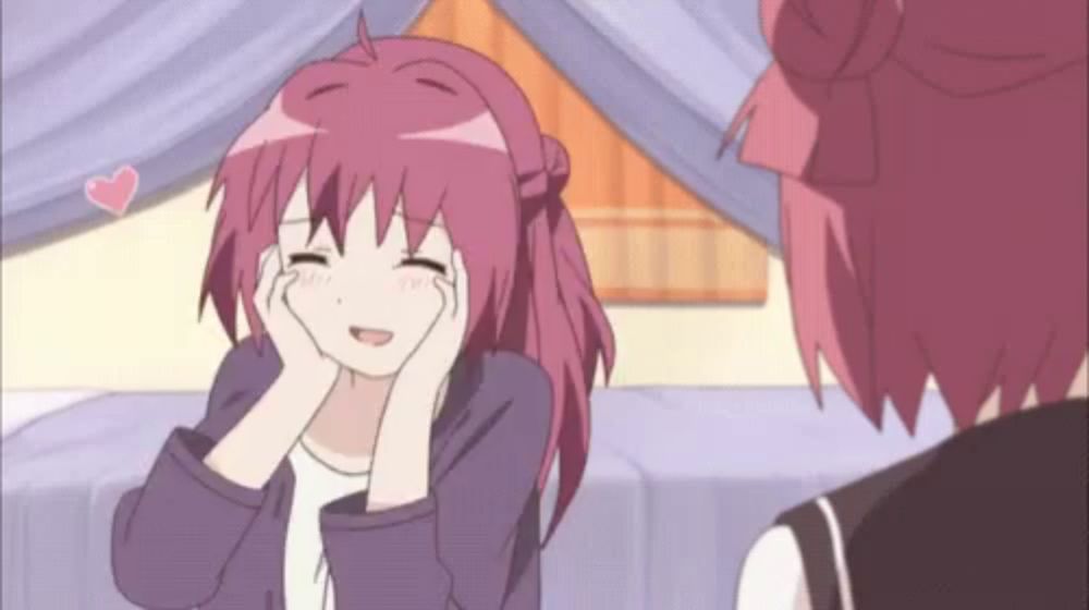 a girl with red hair is smiling with her eyes closed while another girl looks on