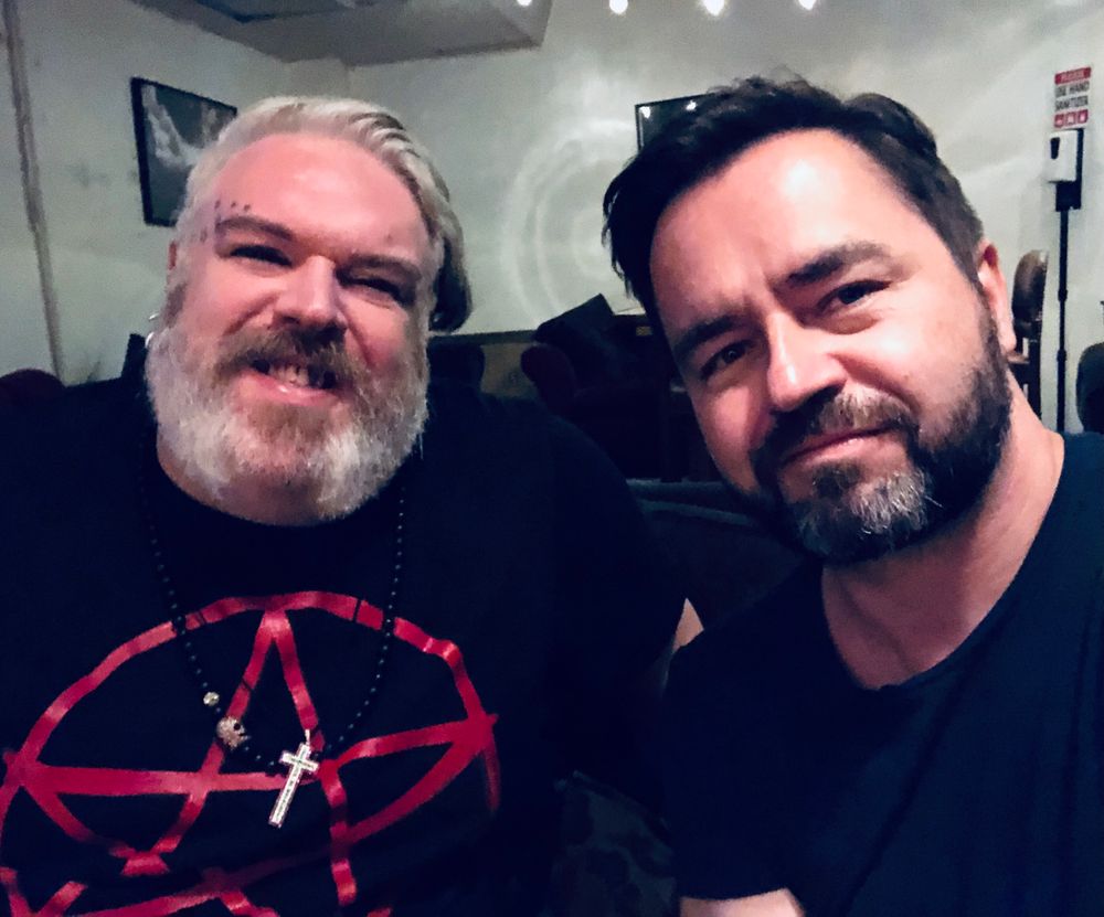 Grey bearded man and brunette bearded man