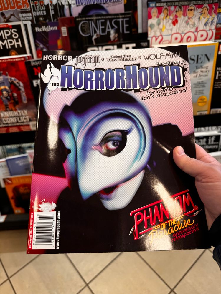 The cover of horrorhound magazine featuring Phantom of the paradise wearing a silver bird helmet