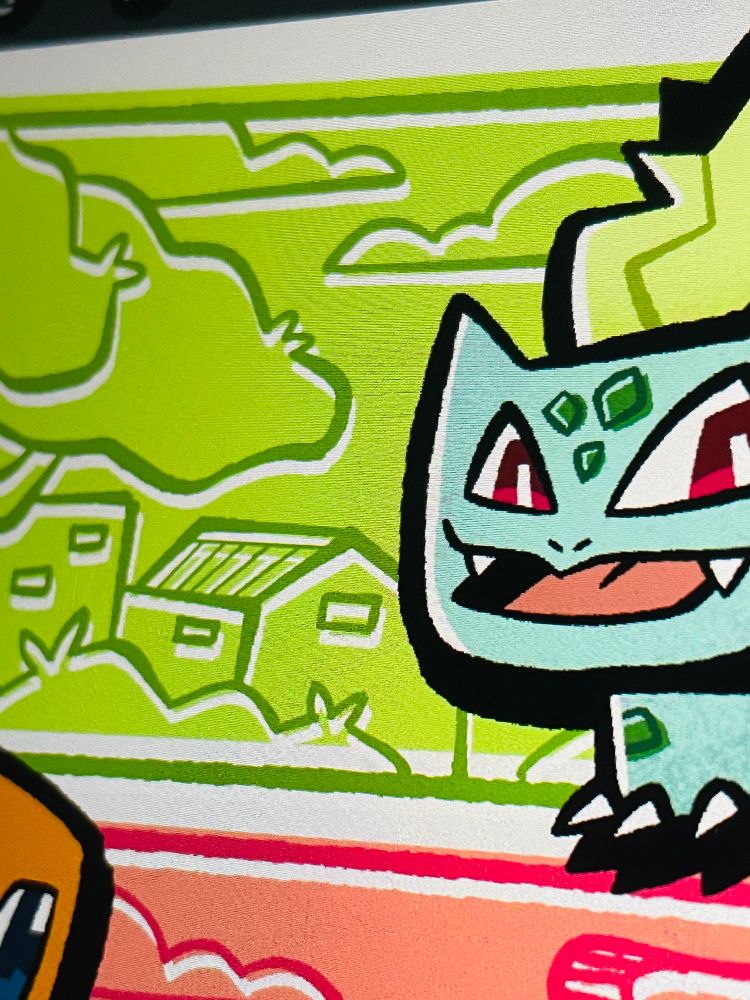 A mostly cropped photo of a screen showing a Pokemon-related artwork featuring Bulbasaur in a cartoony style 
