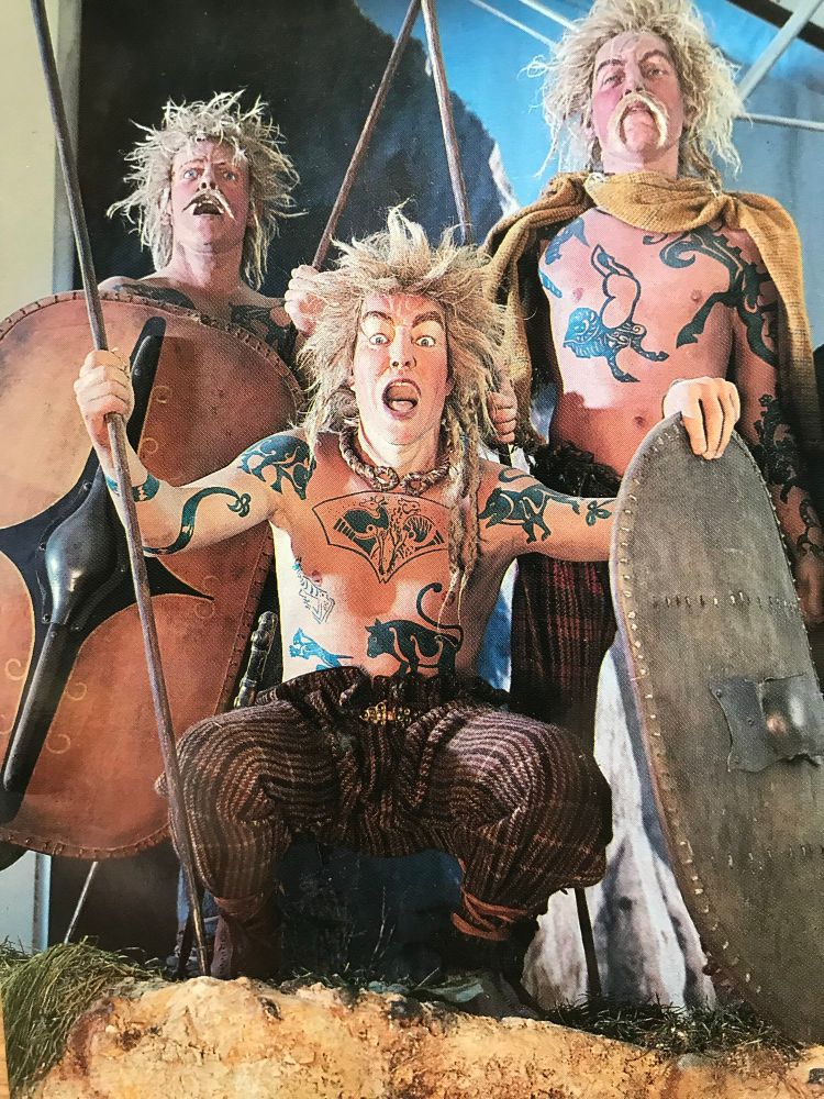 Three waxwork Iron Age warriors.