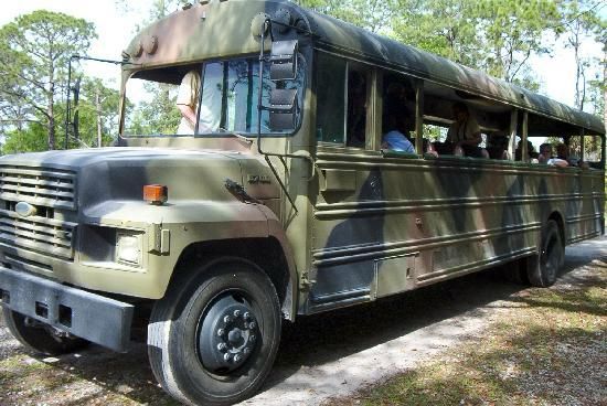 A bus painted in camouflage pattern. That’s the joke. 