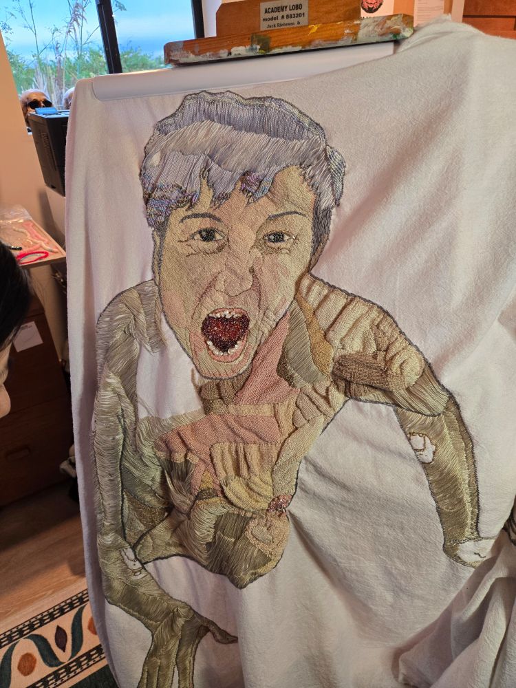 a big yelling beady embroidery selfie