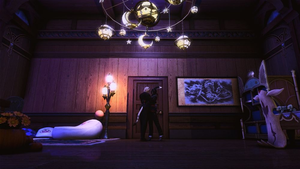 Hrothgar and Viera hold each other mid-sway under a chandelier of moons and stars. 
