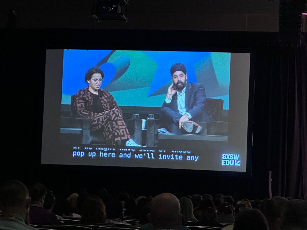 Jasmin Rubero and Simran Jeet Singh sitting on two chairs 