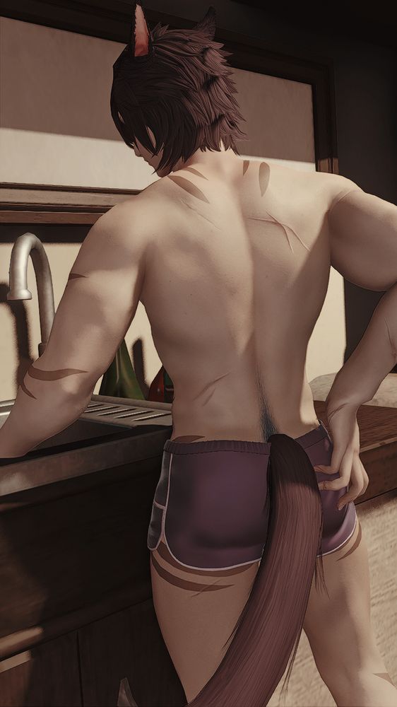 Chi'yo in the morning, standing by the kitchen sink in just tiny shorts, scratching his ass.