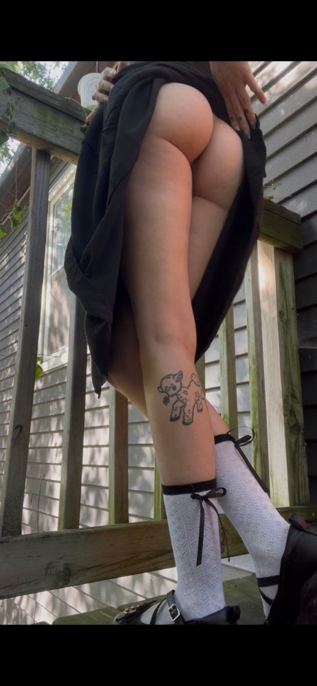 Pony lifts up her black dress to reveal no underwear 