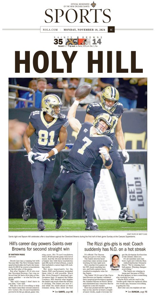 Times-Picayune sports cover featuring a photo of Saints' Taysom Hill spiking the ball as he celebrates a touchdown 