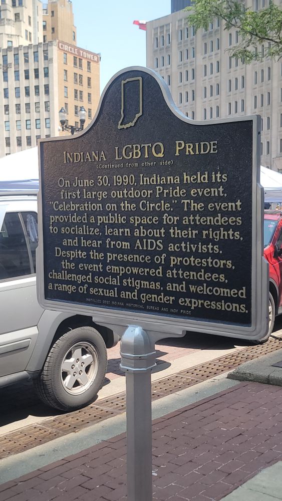 A plaque describing the first large Pride event in Indiana hosted on June 30, 1990.