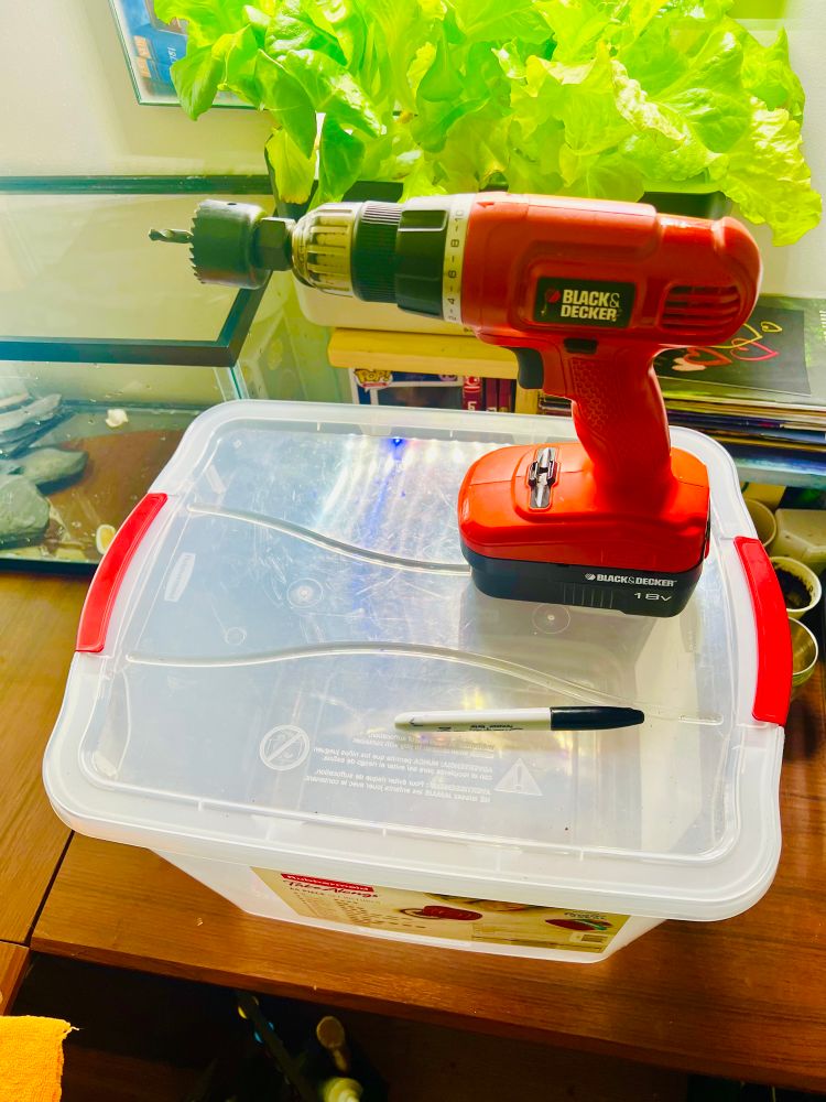 A basic Rubbermaid container, and my old ass drill, w/ circular cut attachment. Sharpie to mark where the holes will be created.