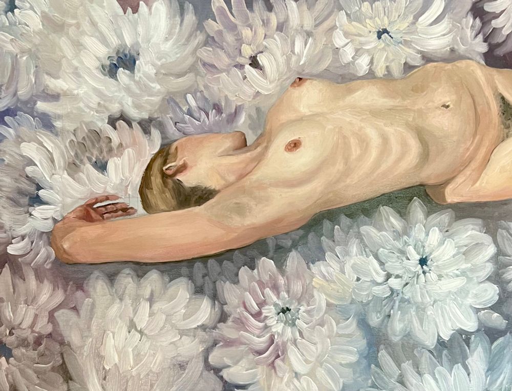 A woman is nude, stretching so you can see the outline of her ribs and shadows of hair in her armpits and crotch. She is surrounded by chrysanthemums. 