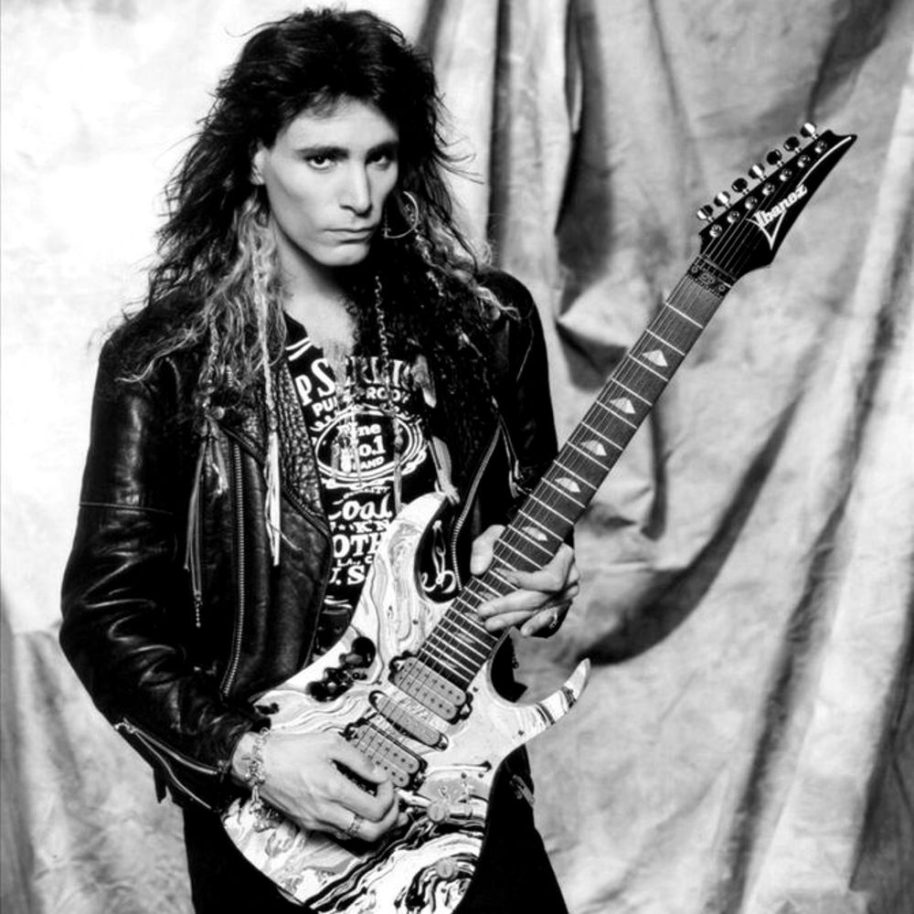 Now Playing on https://www.ProgRock.com The Boy from Seattle (Naked) [2008: Naked Tracks (2)] by Steve Vai #progrock