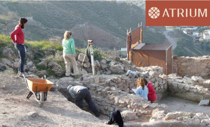 archaeologists at work with ATRIUM logo 