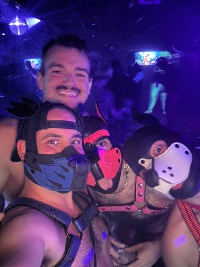 Andy, Aero, and I in our pup hoods and their friend not in a hood. 