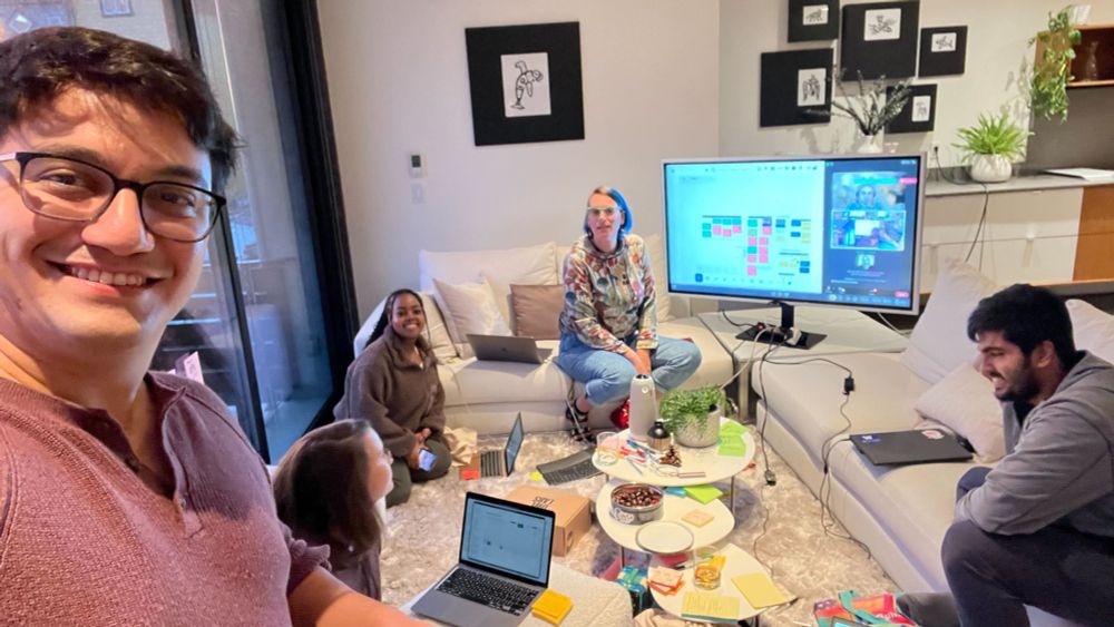 matsulab members sit around a virtual screen