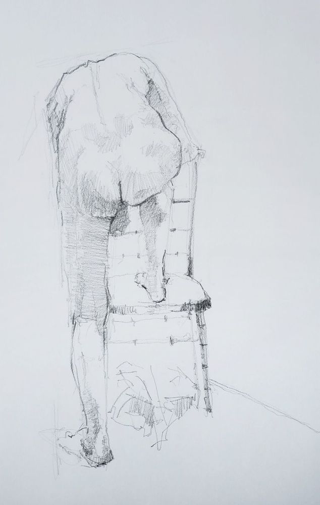 25 minute drawing with a 6B pencil on A2 cartridge paper. Rear view of a thin man with foot resting on a chair.