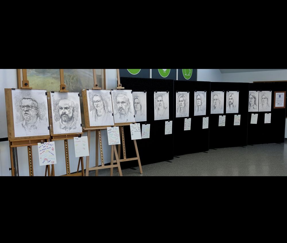 Twelve head drawings on A2 paper in pencil on display in the foyer of the Royal Victoria Hospital in Belfast. Each drawing is of a member of the National Health Service team and is titled with their role and accompanied with their notes of what was happening in their head during the drawing process. All as a part of the Northern Ireland Mental Health Arts Festival.