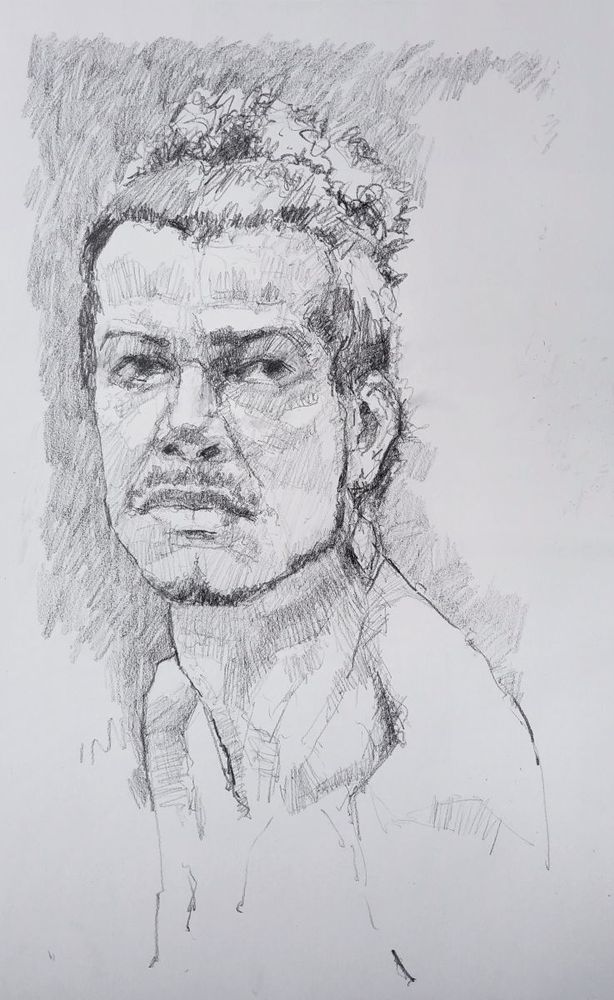 60 minute drawing with a 6B pencil on A2 cartridge paper. Head study of a young man facing forward.
