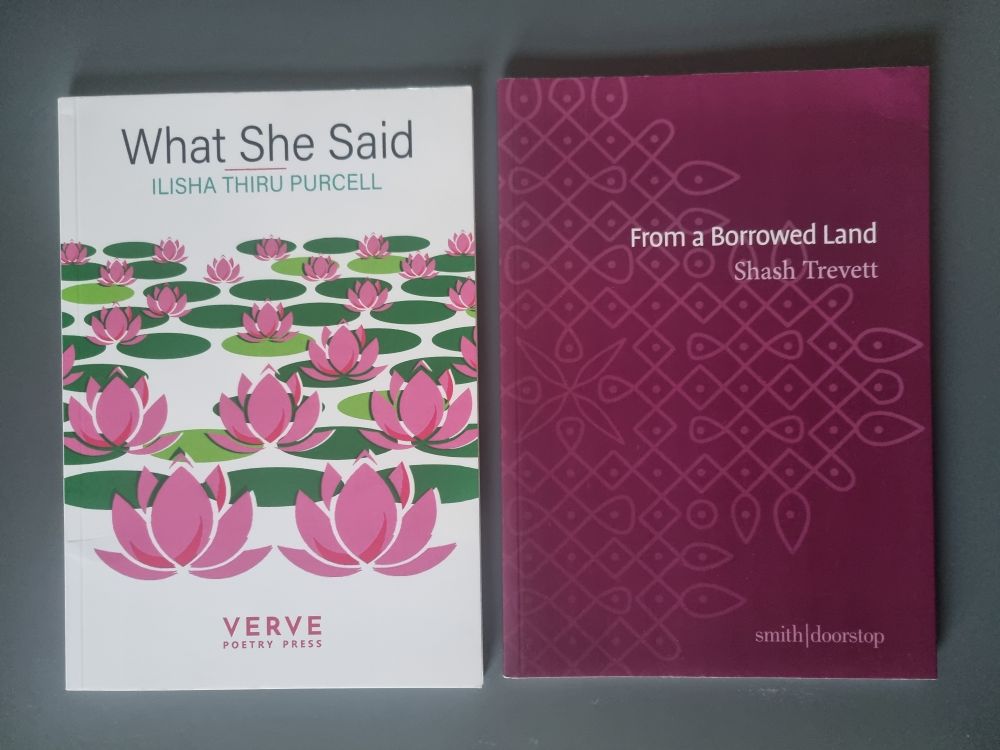 Two poetry pamphlets. What She Said by Ilisha Thiru Purcell and From a Borrowed Land by Shash Trevett 