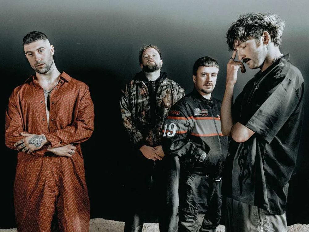 Band photo of excellent Manc band Maruja all wearing very goofy shit and sporting all the different goofy haircuts du jour 