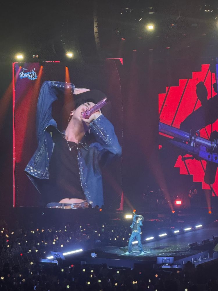 kim seokjin performing rope it showing a sliver of tummy while doing his iconic body roll 