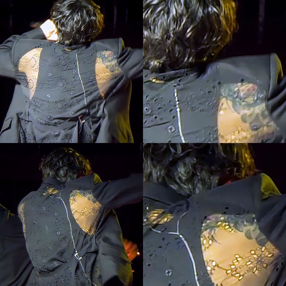 four picture collage showing jungkook's back during the runseokjin tour encore and he's wearing a see through lacey embroidered black blazer in  the back and a black tank top beneath. his shoulder tattoo is peeking slightly and showing detailing going up by his traps