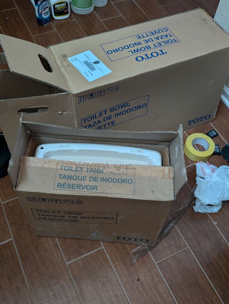 toilet components in boxes 