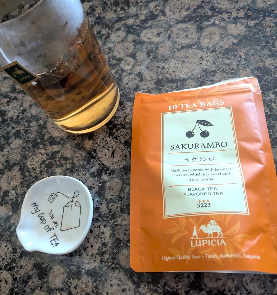 teabag holder + brewing tea cup + tea brand