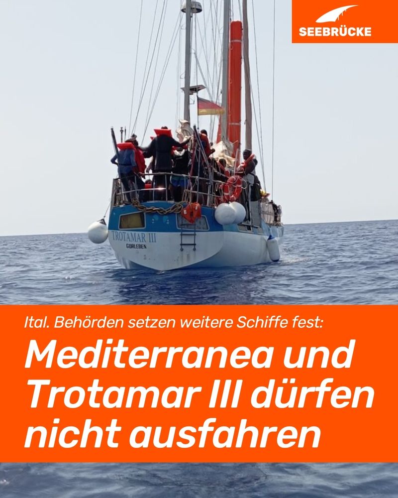 Photo of the Trotamar III. An orange box reads: ‘Italian authorities detain more ships: Mediterranea and Totamar III not allowed to leave port.’ In the upper right corner is the Seebrücke logo in white on orange.