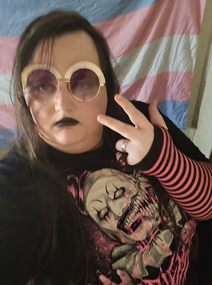 Picture of me in pink sleeves with a pink terrifier shirt