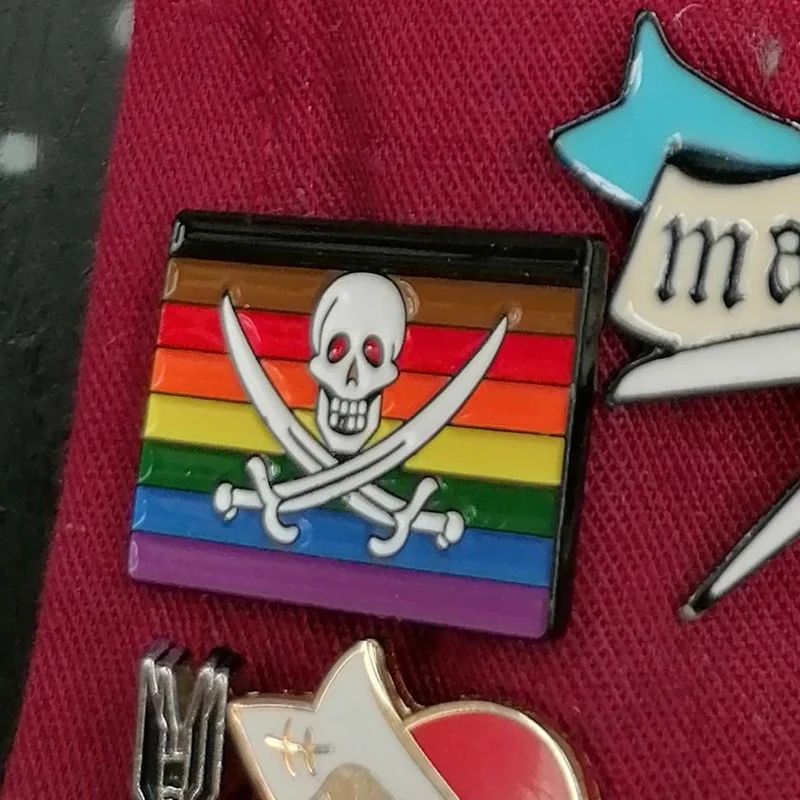 A Pride Flag Pirate Pin