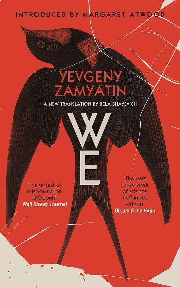 The book We by Yeygenu Zamyatin with a forward by Margaret Atwood. A red cover with a blackbird centered in the front. 