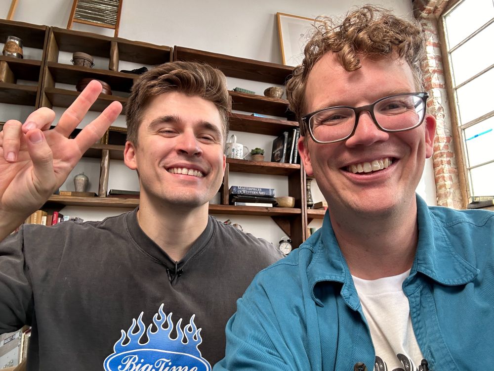 A behind-the-scenes photo of Ludwig Ahgren and Hank Green on the set of Ask Hank Anything. 