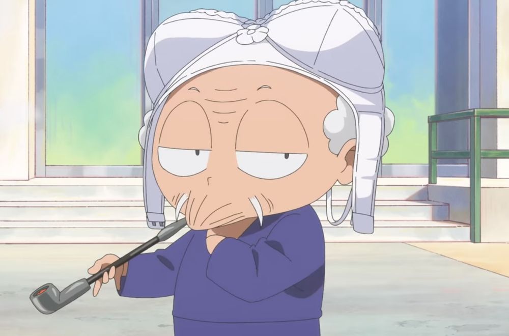 A screenshot of Happosai holding his pipe and wearing bra on his head 