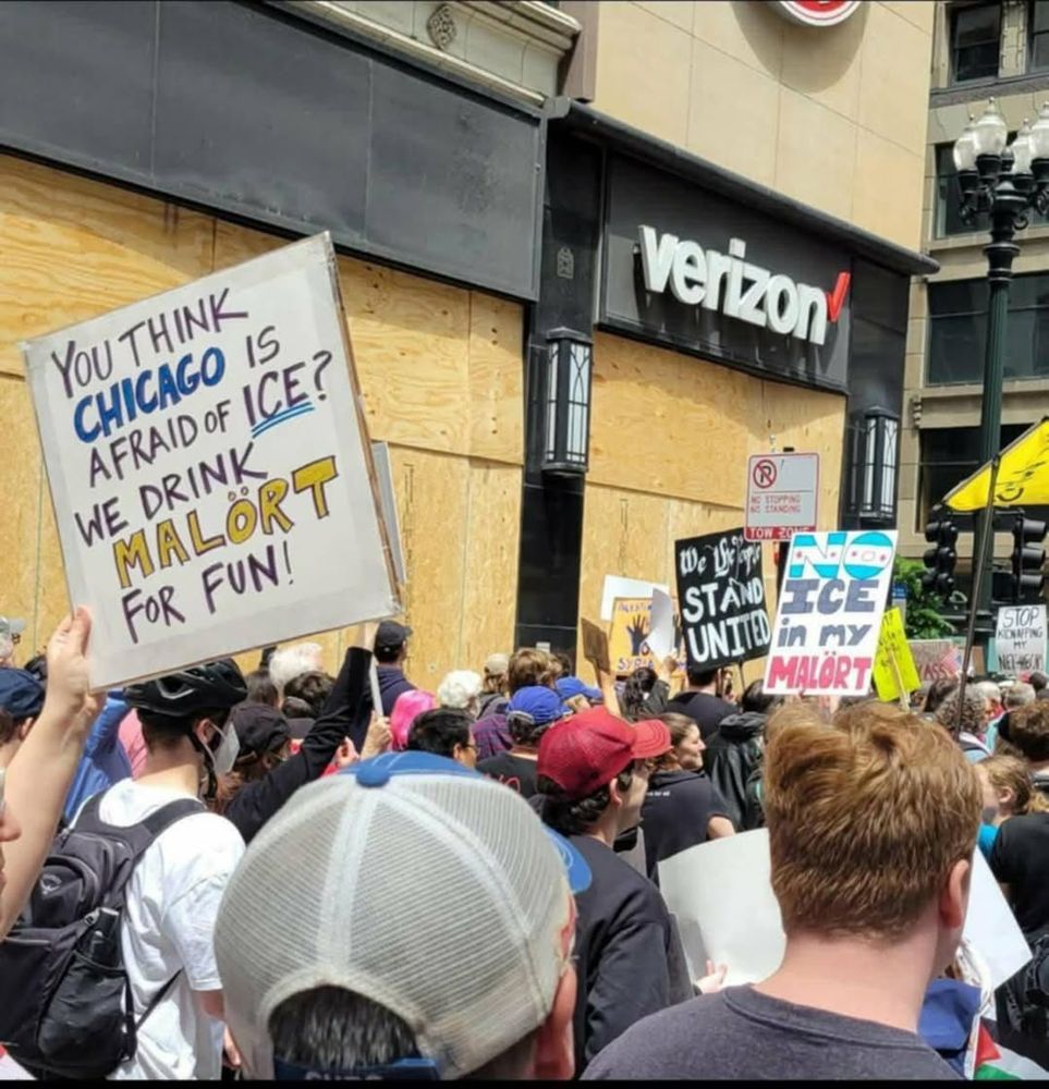 Sign: "You think CHICAGO is afraid of ICE? We drink MALÖRT for fun!"