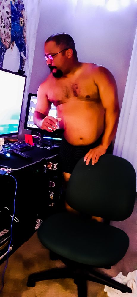 An older photo from months ago after a videoshoot, having a glass of wine 