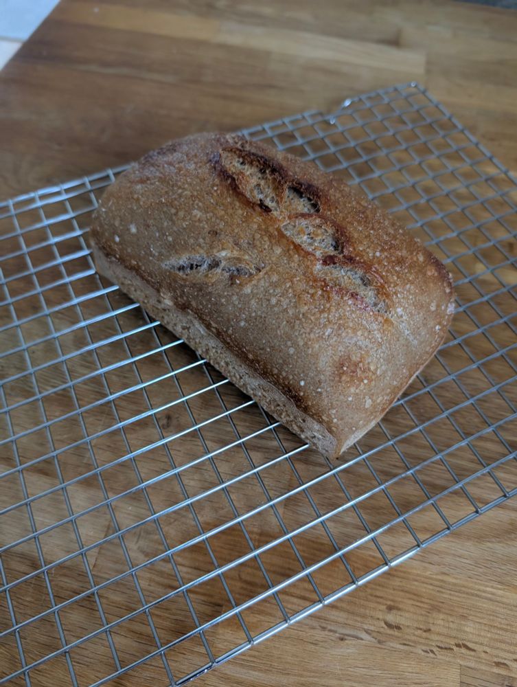 Sourdough sandwich loaf on a cooling rack 