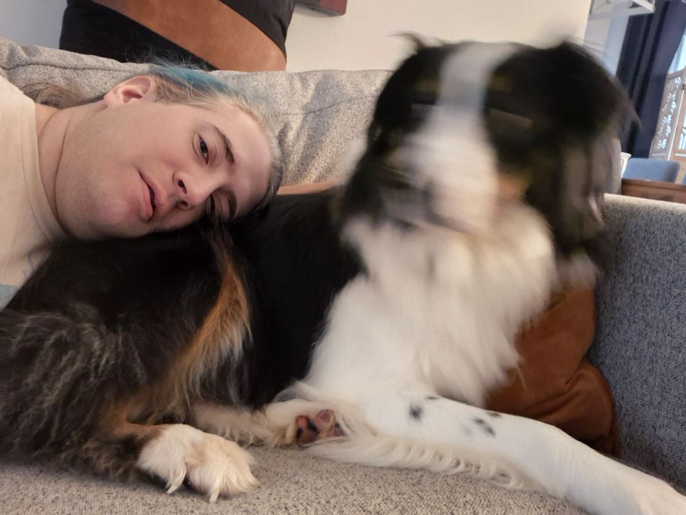 Me still laying my head on Cosmo, but his head is a blur.