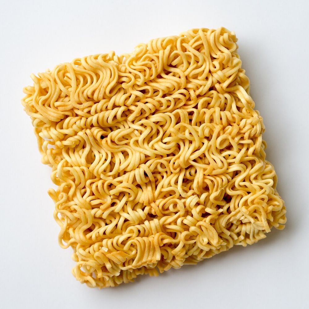 Photo of a brick of dry ramen.

Explanation of the joke: dry ramen is associated with Justin Timberlake's hair circa a certain era, who is associated with empatically singing a lyric that sounds like 'IT'S GONNA BE MAY', often circulated just before it's going to be May.