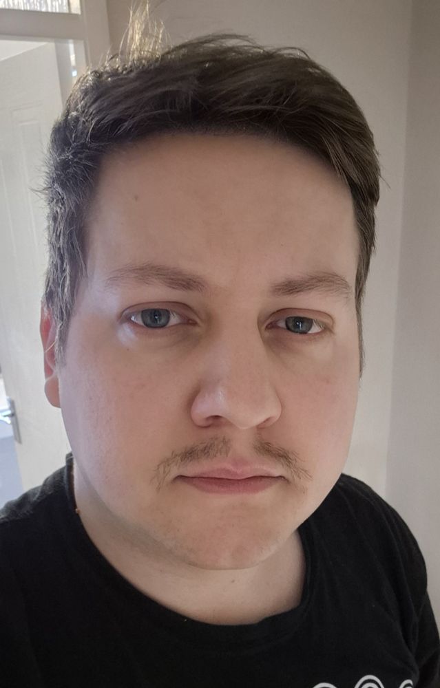 My face with the the shadow of a hint of a whisper of facial hair