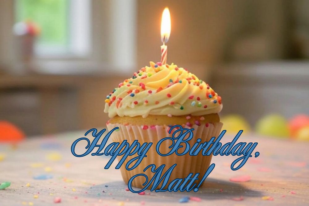 Image: Birthday cupcake with one lit candle and annotated "Happy Birthday, Matt" in honor of @CrankyCyborg.bsky.social's birthday today ❤️