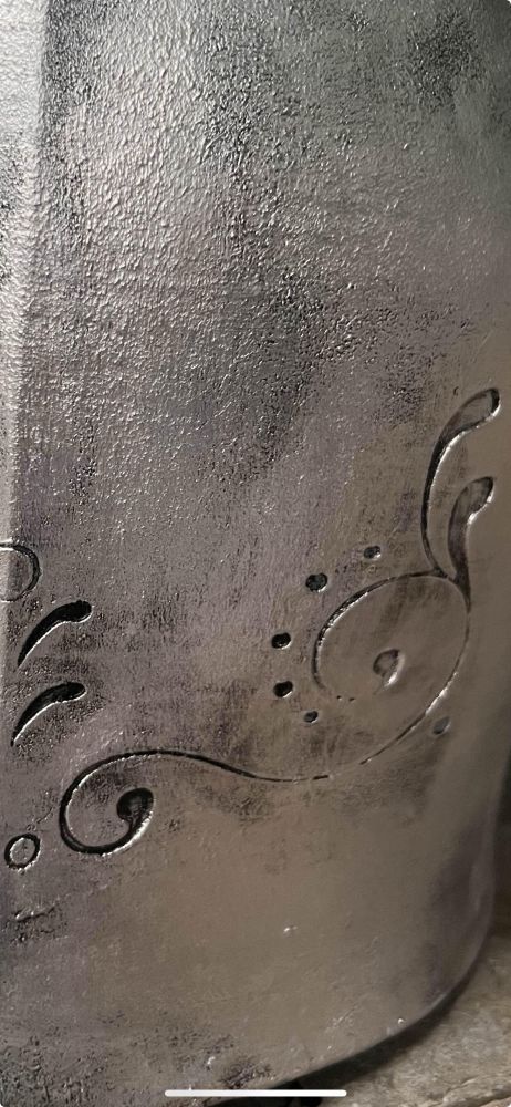 Close up of a helmet showing the paint job details. 