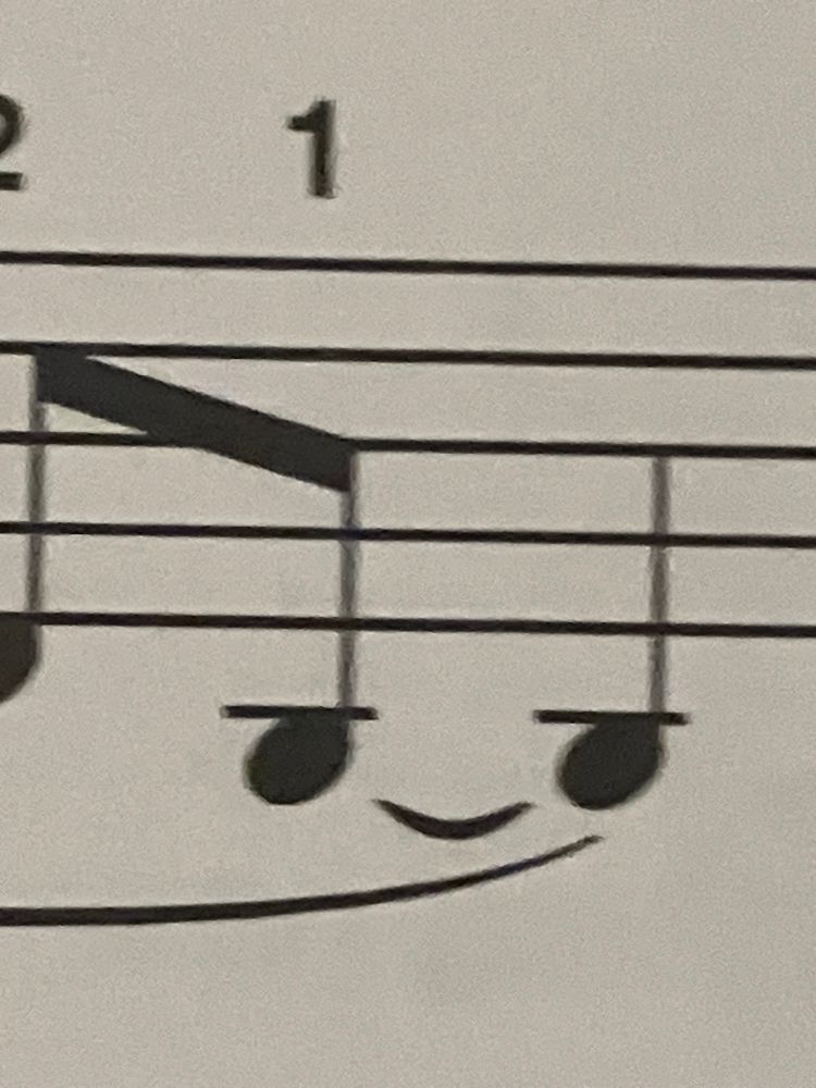 Music notes looking like a smiling face