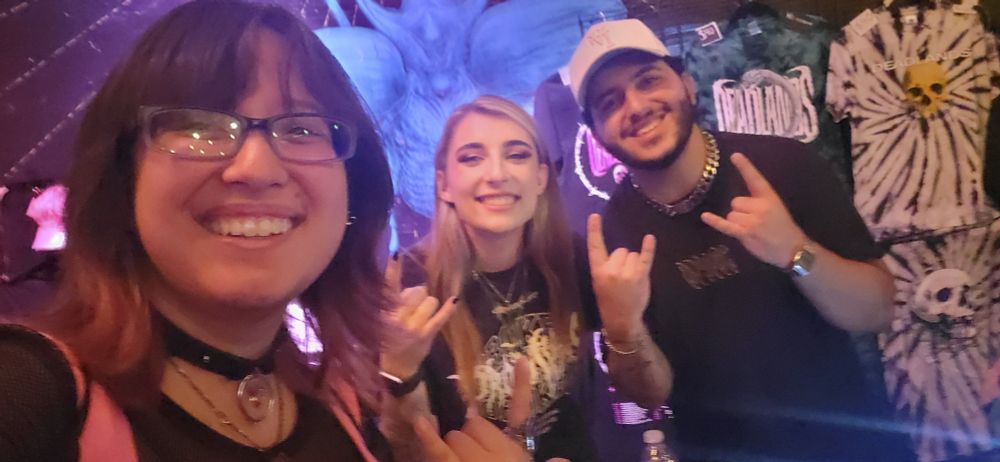 A selfie I took with Deadlands at their merch table 