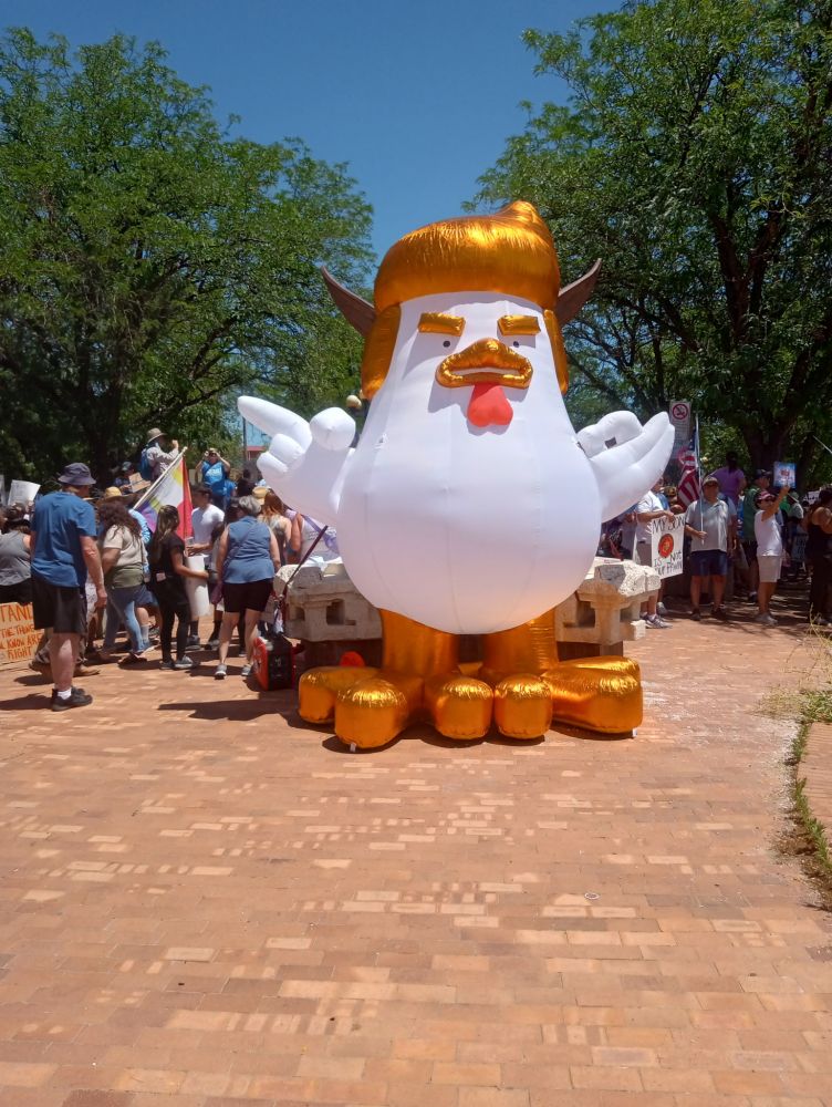 A giant Trump chicken balloon.
