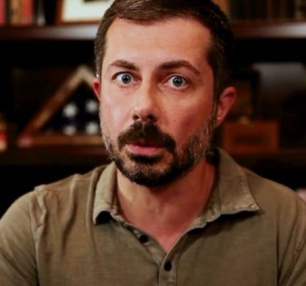 Bearded Mayor Pete looking alarmed, eyes bugging out 